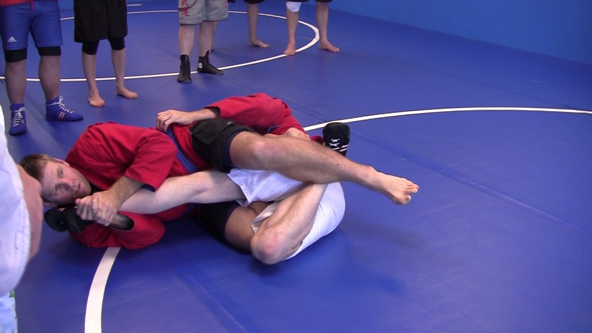 Coach Serge Gerlach demonstrating a Kneebar.